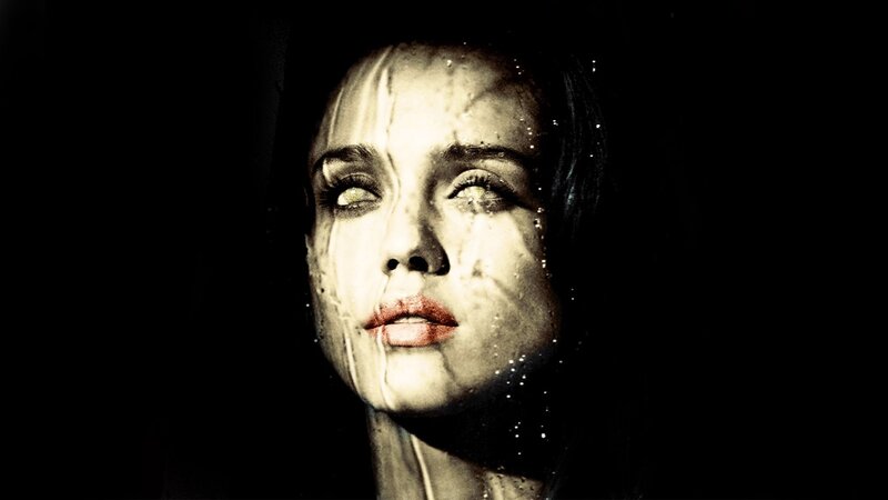 woman with water on face