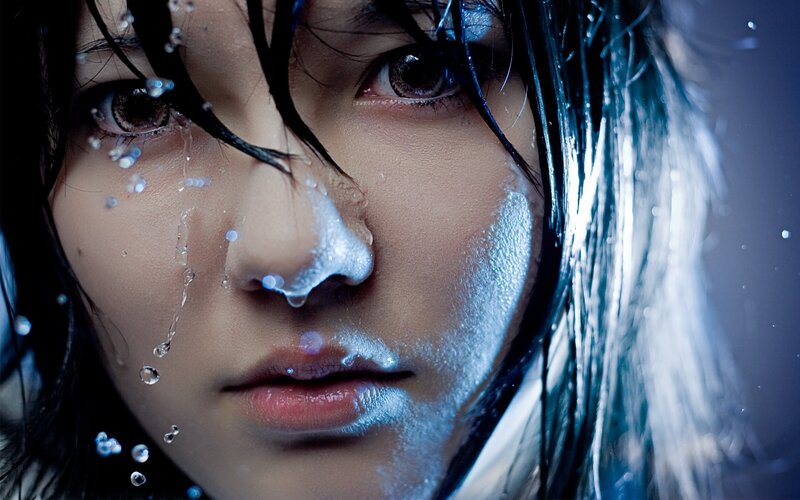 woman with water on face