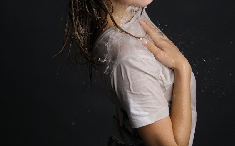 woman with water on her neck