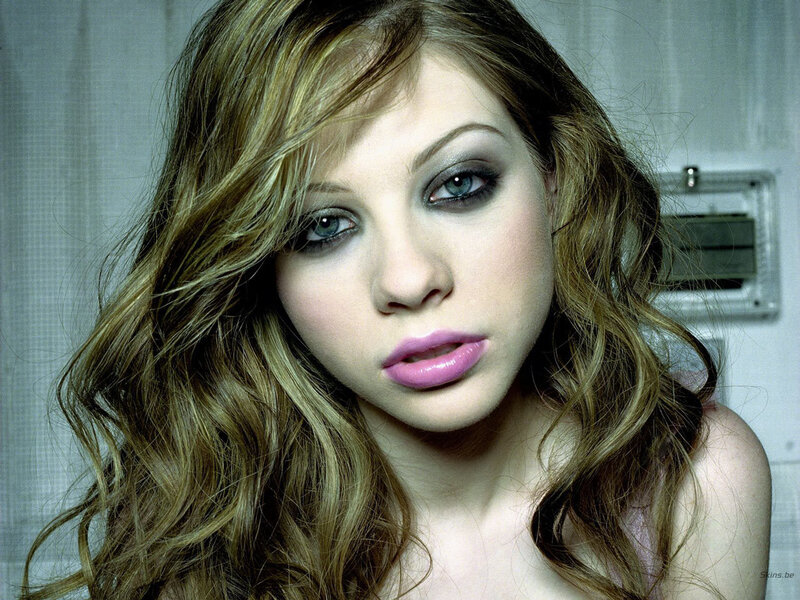 woman with wavy hair and makeup