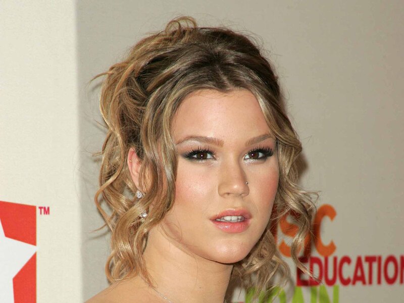 woman with wavy hair at event