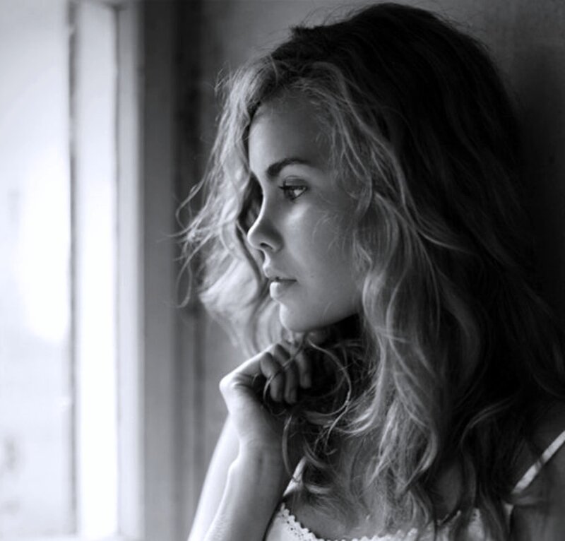 Woman with Wavy Hair — Black, Contemplative, Photograph