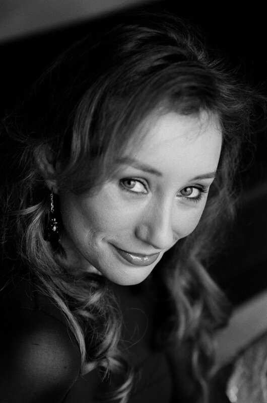 Woman with Wavy Hair — Black, Dramatic, Photograph, Earring, Smile