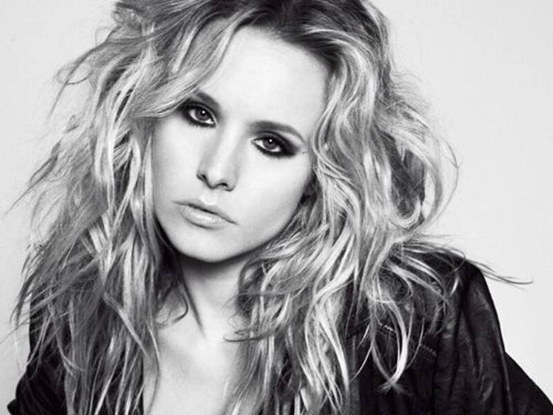 Woman with Wavy Hair — Black, Serious, Photograph, Jacket
