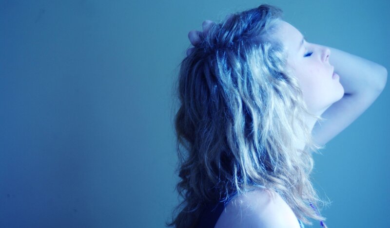 Woman with Wavy Hair — Blue, Serene, Photograph
