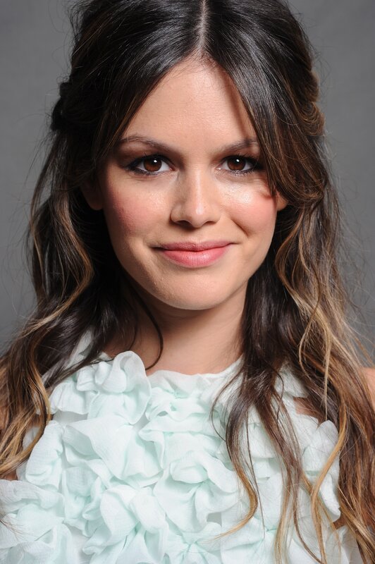 woman with wavy hair smiling