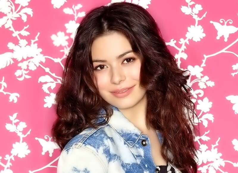 woman with wavy hair smiling
