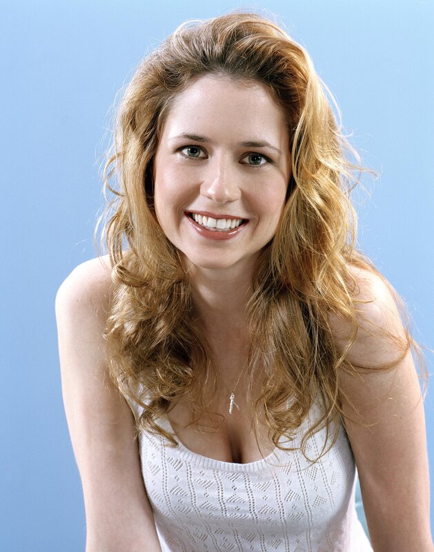 woman with wavy hair smiling