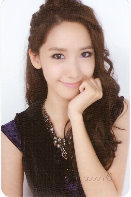 woman with wavy hair smiling