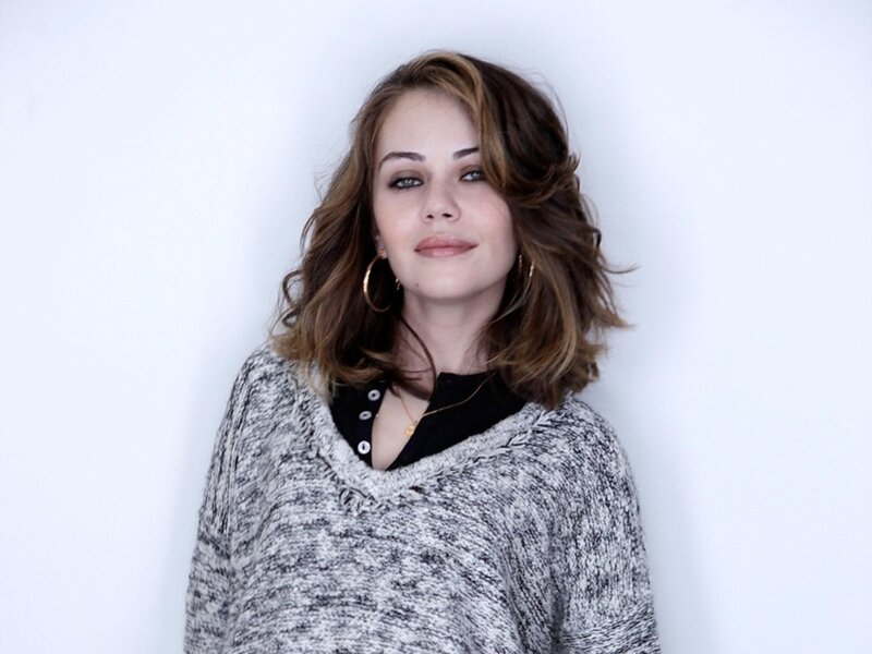 Woman with Wavy Hair — White, Neutral, Photograph, Sweater