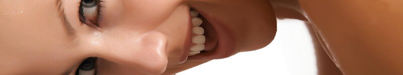 woman with wet face smiling