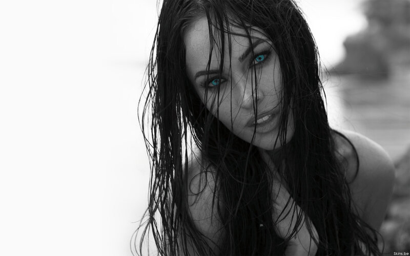 woman with wet hair and blue eyes