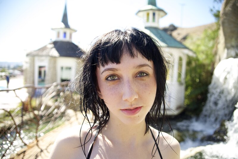 woman with wet hair at water park