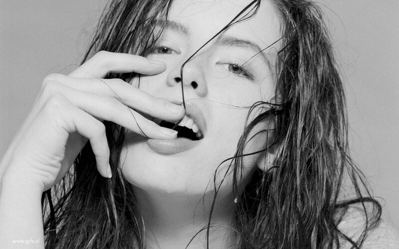 woman with wet hair in black and white