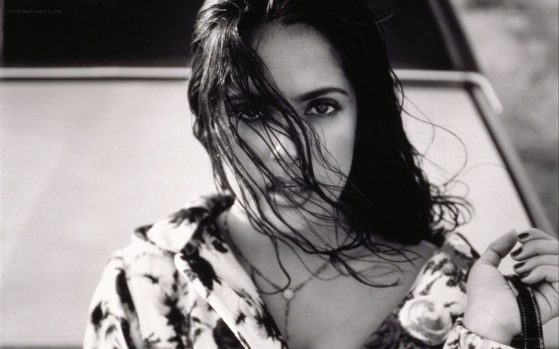 woman with wet hair in black and white