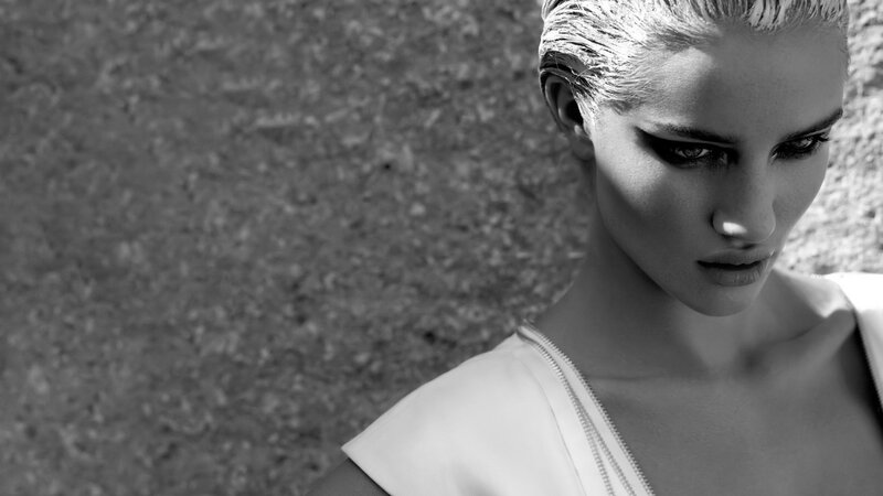 woman with wet hair in black and white