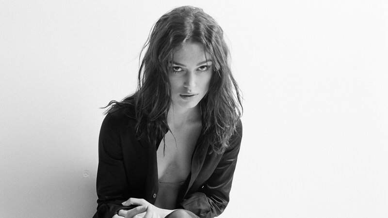 woman with wet hair in black and white
