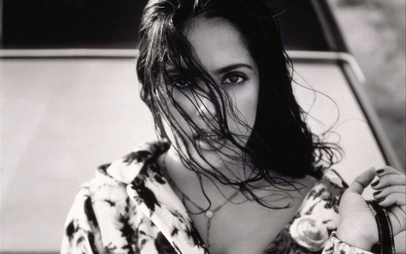 woman with wet hair in black and white