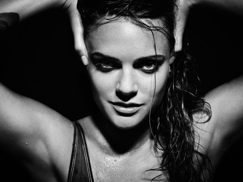 woman with wet hair in black and white