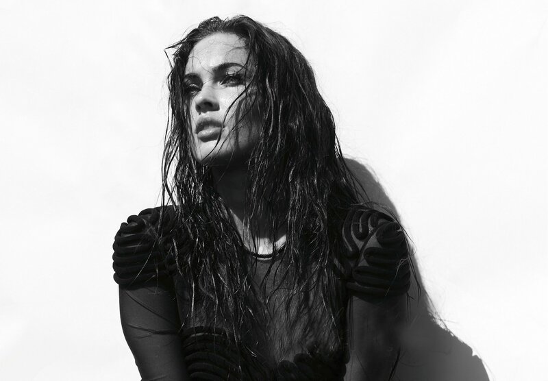 woman with wet hair in black and white