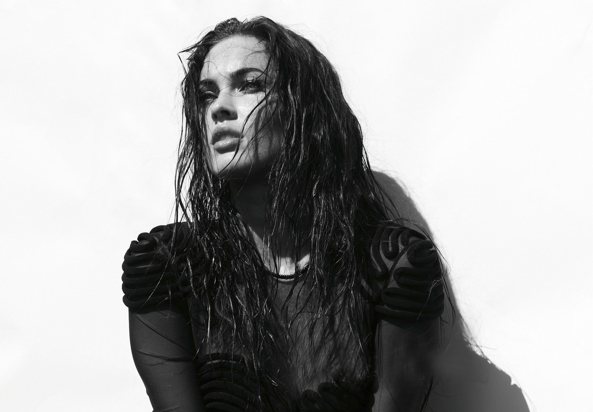 woman with wet hair in black and white