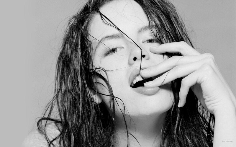 woman with wet hair in black and white