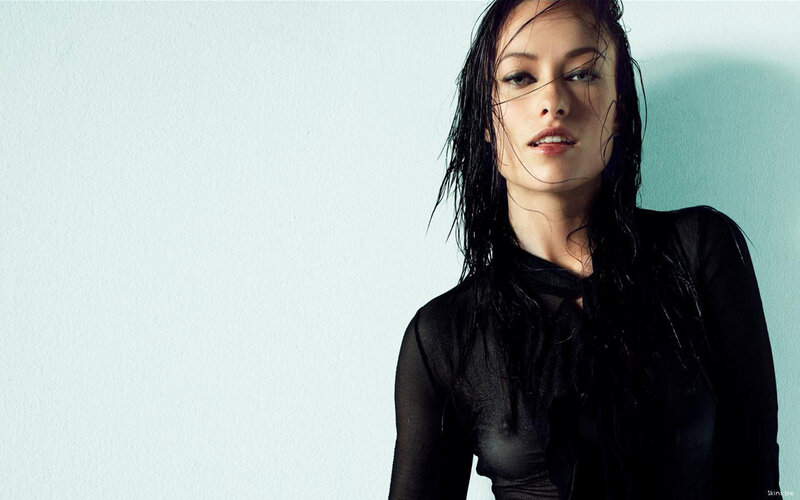 woman with wet hair in black top