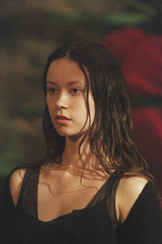 woman with wet hair in black top
