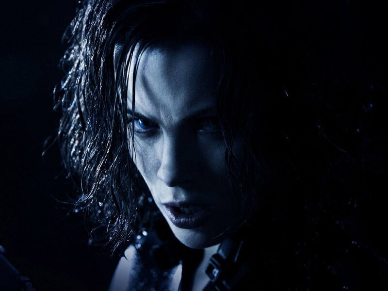 woman with wet hair in dark scene