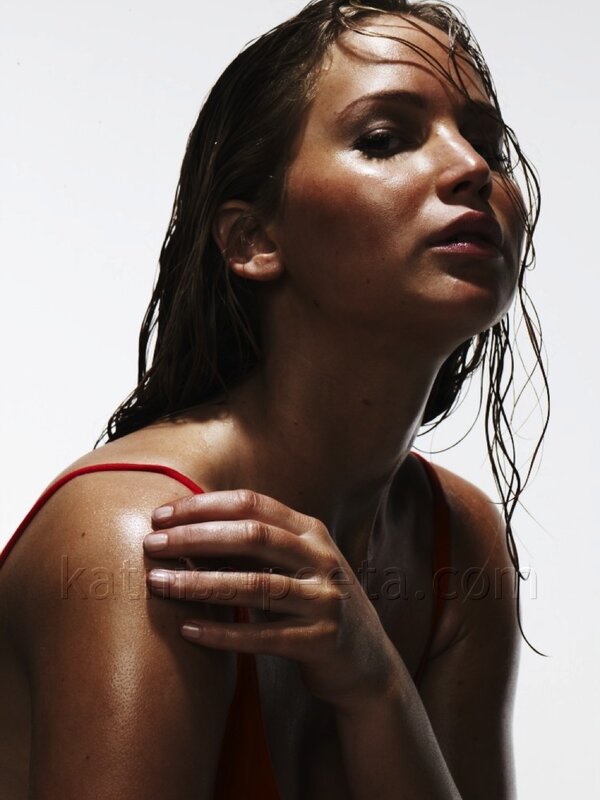 woman with wet hair in red top