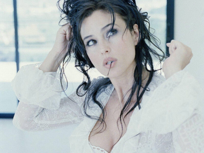 woman with wet hair in white blouse