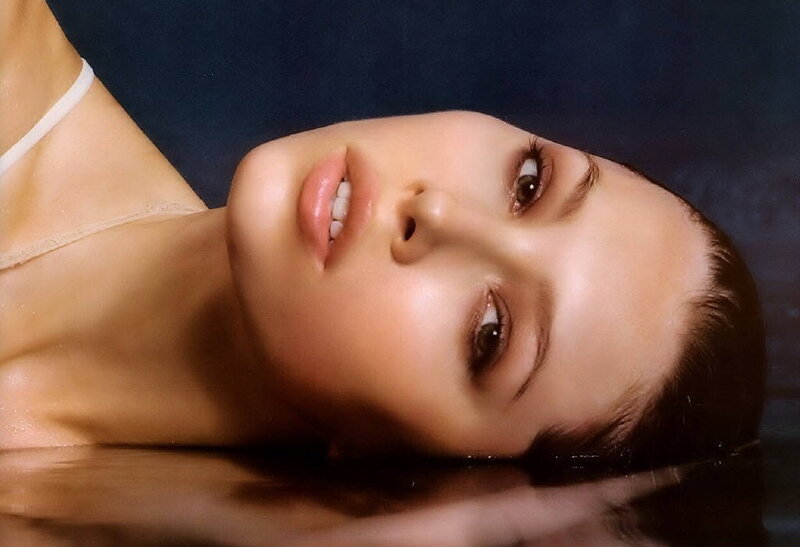 woman with wet hair lying down