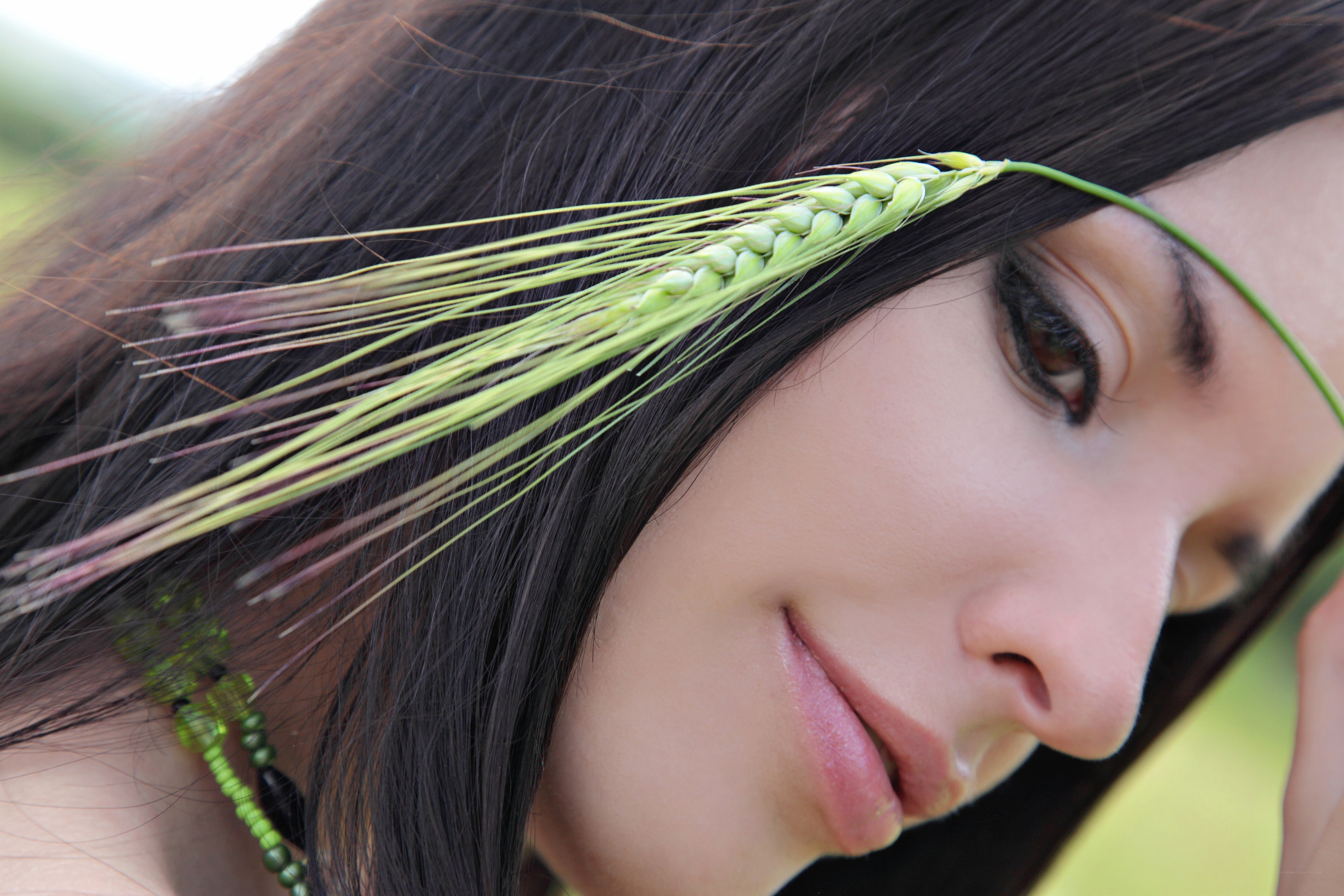 woman with wheat stalk