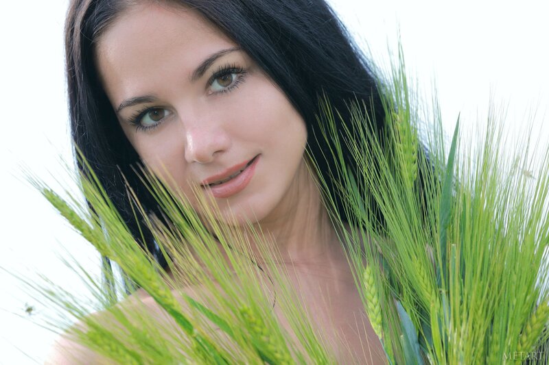 woman with wheat stalks