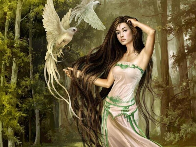 woman with white birds in forest