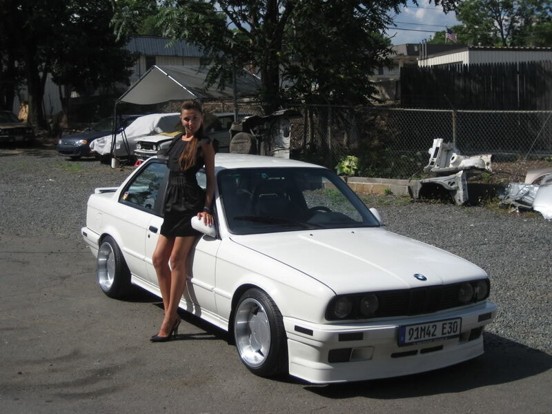 woman with white bmw car