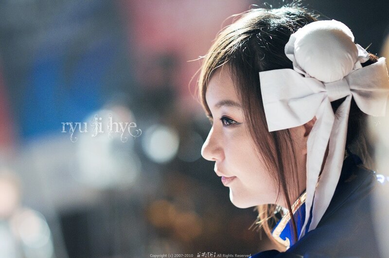 woman with white bow in profile