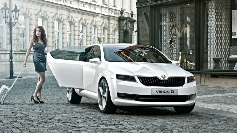Woman with white car on cobblestone