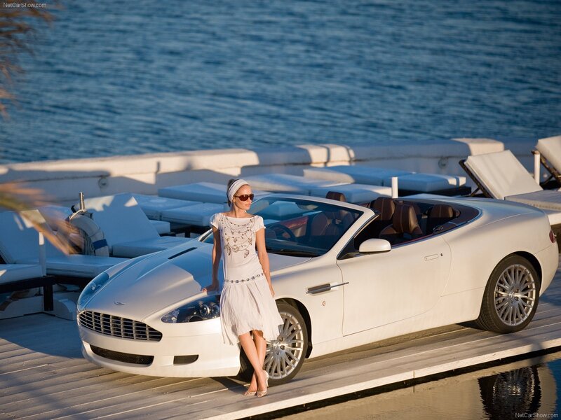Woman with white convertible car