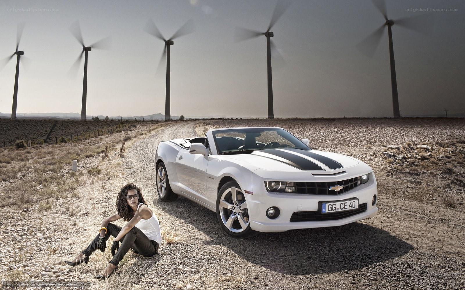 Woman with white convertible car