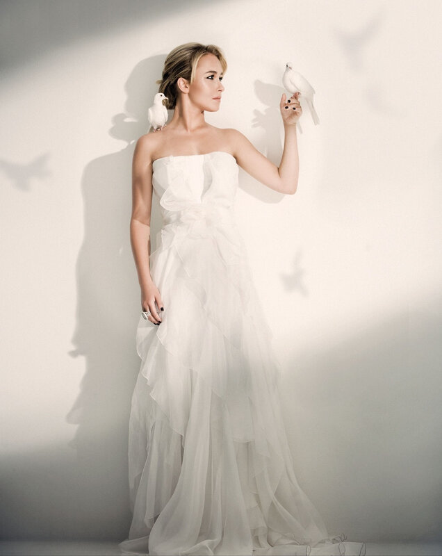 woman with white doves