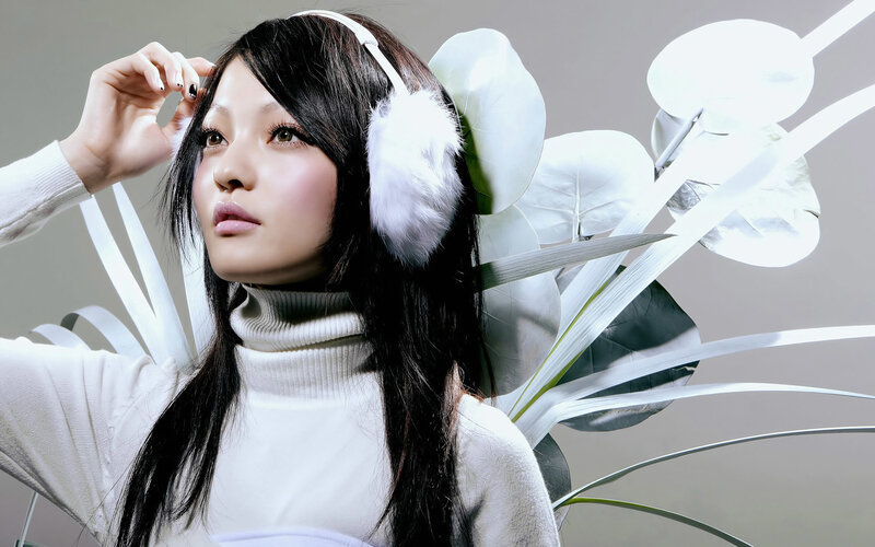 Woman with White Earmuffs