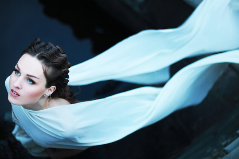 Woman with White Fabric — Dramatic