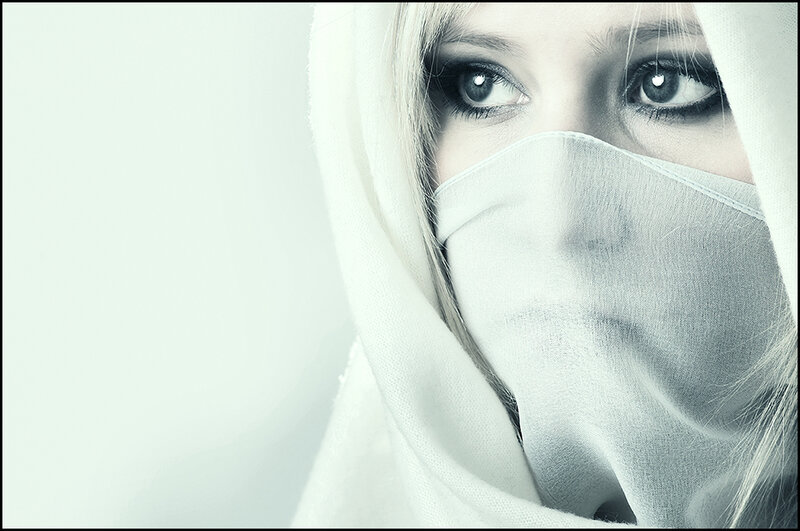 woman with white face covering