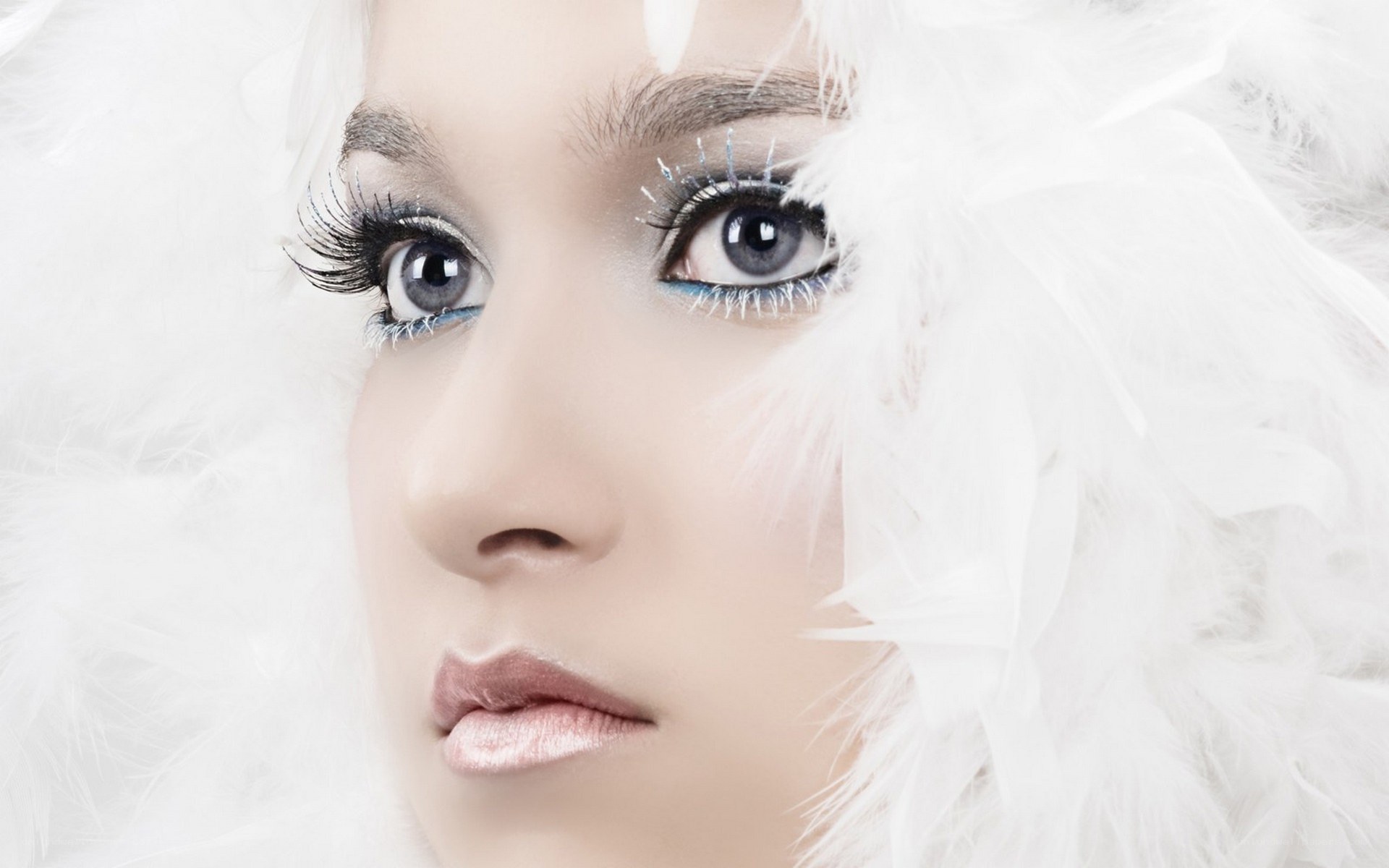 woman with white feathers
