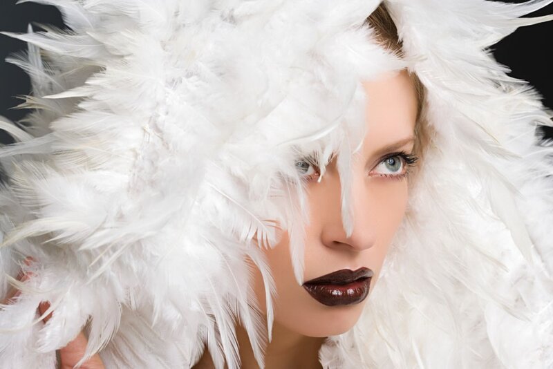 Woman with White Feathers — Dramatic, Photograph, Makeup
