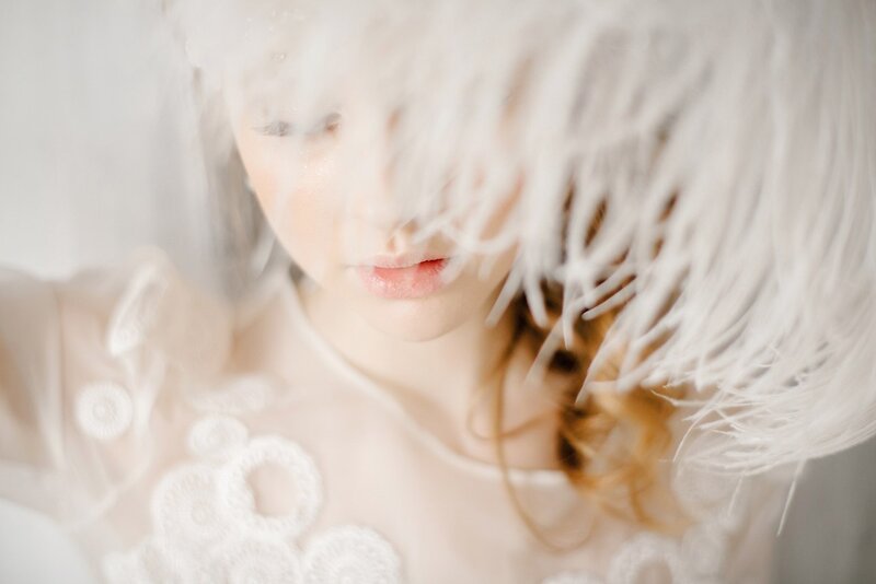 Woman with White Feathers — Dreamy