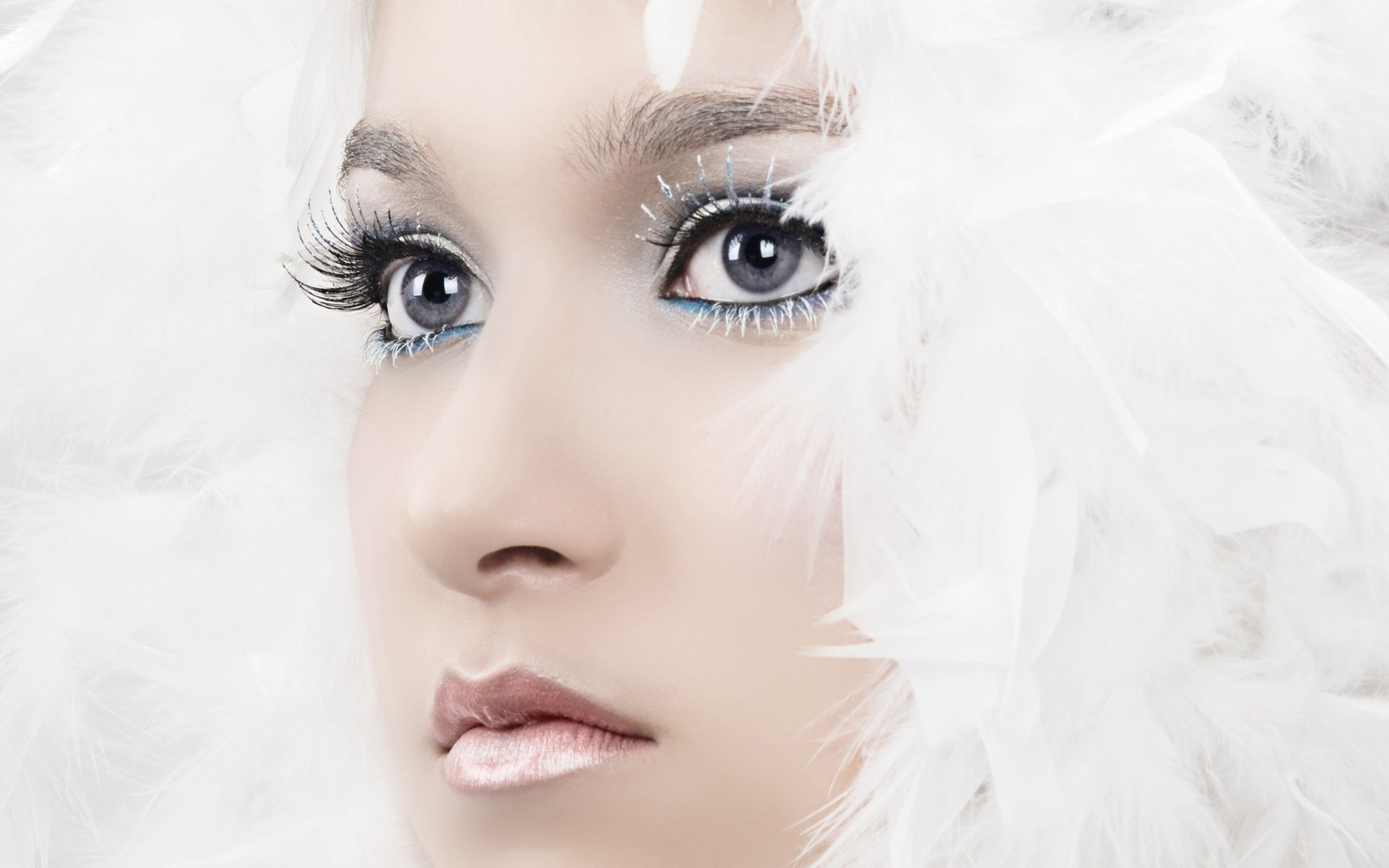 woman with white feathers