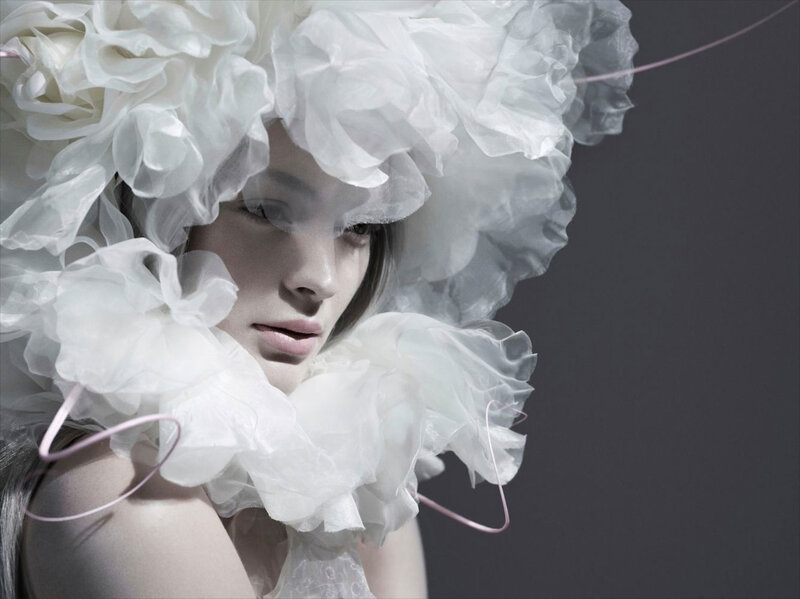 Woman with White Floral Headpiece — Dramatic