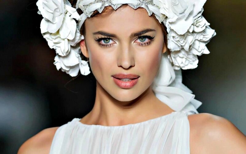 woman with white floral headpiece
